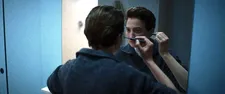Mark applies green under eyeliner: "This scene came about because Alba was doing this instinctively."